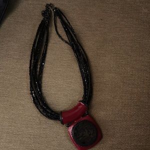 BEAUTIFUL COSTUME JEWELRY. DARK WINE COLOR WITH BLK STRANDS
